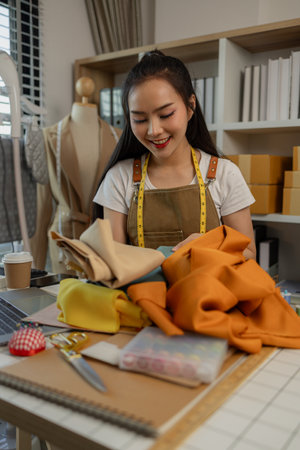 a beautiful tailor is working on her favorite craft in a studio filled with a variety of sewing...