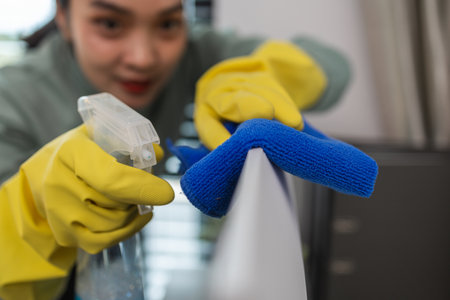a company's cleaning lady is diligently cleaning the executive's office, the cleaning lady wears...