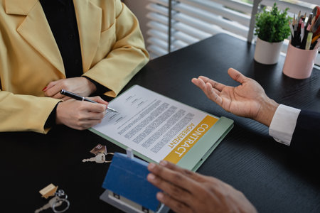 a real estate agent is explaining the details of a home purchase contract to a buyer, he is telling...
