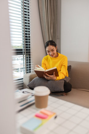 a woman is spending her holiday in the living room of her house, feeling peaceful and happy because...