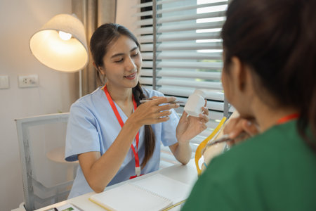 two doctors are meeting to exchange new knowledge and information they have gained form their...