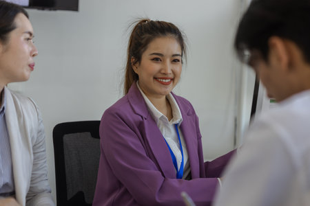entrepreneurs brainstorm together to develop new products in a conference room, businesspeople share knowledge on marketing strategies and finance4s with each other, accountant, businessmanの写真素材