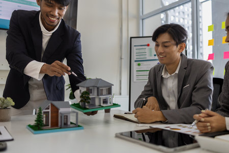 concept for selling a house and home insurance. Signing a house purchase and sale agreement, housing rental, mortgage, real estate, rent, selling, loan, property, agentの写真素材