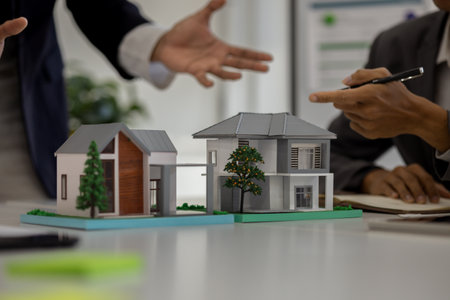 concept for selling a house and home insurance. Signing a house purchase and sale agreement, housing...