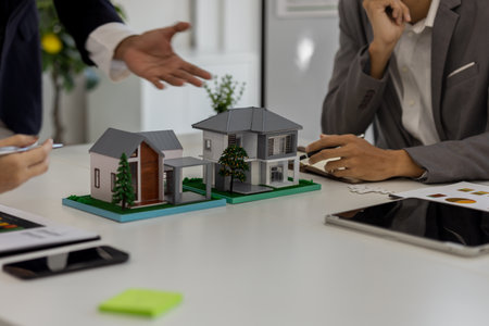 concept for selling a house and home insurance. Signing a house purchase and sale agreement, housing rental, mortgage, real estate, rent, selling, loan, property, agentの写真素材