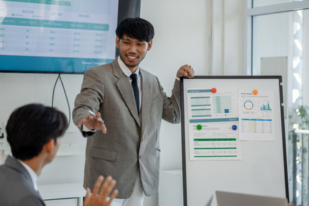 the atmosphere of working together between the marketing and accounting departments, business people meet together to find solutions to the company's problems, finance, financial, businessmanの写真素材