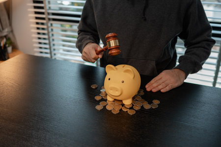 a man uses his savings to buy his dream home, this man plans his finances to buy a home, he uses his savings to buy a home as an investment, financial, money, property, paymentの写真素材