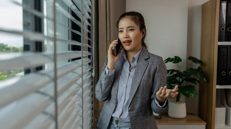 a female employee is working in an office, a businesswoman is handling urgent financial matters, a...