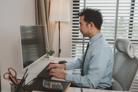 a businessman is sitting in his private office, an entrepreneur is working diligently, the chief...