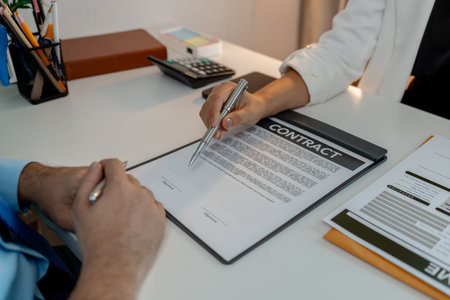 the HR manager has new employees who come in for a job interview sign a contract so that they become full-time employees, signing contract in human resources office, recruitmentの写真素材
