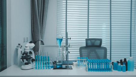 a science laboratory atmosphere filled with a variety of scientific equipment, a clean and fully-fledged science laboratory filled with chemicals for experiments, microscopeの写真素材