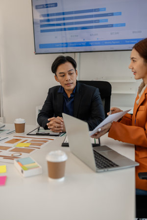 one of marketing team is explaining the presentation to the team, group of businessman are meeting...