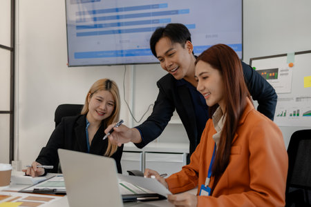 businessman is discussing with his team about business, group of entrepreneur are brainstorming in the office, they are meeting in the company, accounting, marketing, financialの写真素材