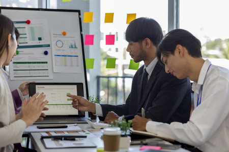 entrepreneurs brainstorm together to develop new products in a conference room, businesspeople share knowledge on marketing strategies and finance4s with each other, accountant, businessmanの写真素材