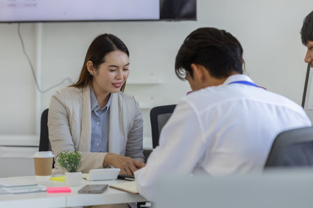 entrepreneurs brainstorm together to develop new products in a conference room, businesspeople share knowledge on marketing strategies and finance4s with each other, accountant, businessmanの写真素材