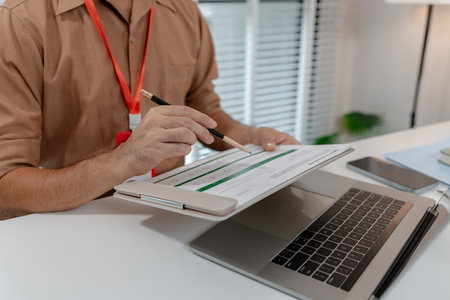 businessman is working in his private office, marketing manager works with a lot of paperwork, an...
