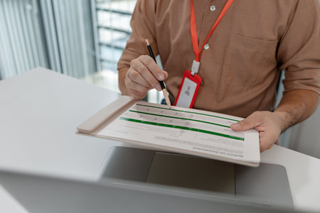 businessman is working in his private office, marketing manager works with a lot of paperwork, an...