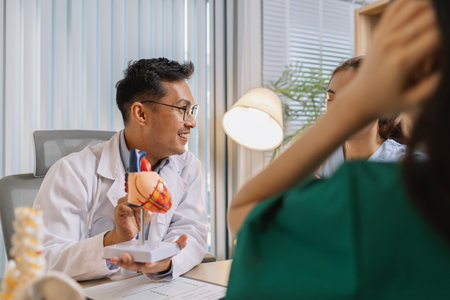 Medical professionals collaborating during a meeting to discuss patient care plans and treatment strategies. Doctors and nurses share expertise and analyze clinical data for better healthcare outcomesの写真素材