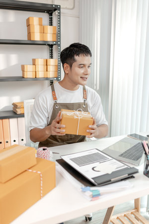 Ecommerce startup demonstrating modern online business model, combining packaging, logistics, and digital retail strategies to empower small business growth in global trade.の写真素材