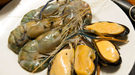 fresh shrimp and shellfish ready to cookの写真素材