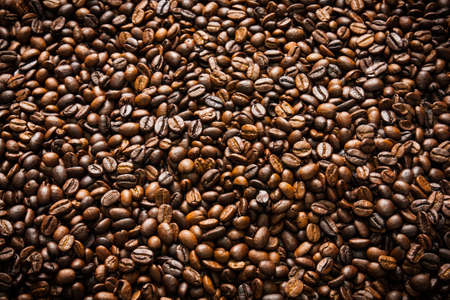 brown coffee beans close-up of coffee beans for backgroundの写真素材