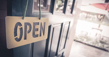Vintage wooden door open sign and handleの写真素材