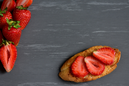 Fresh strawberries on a rustic backgroundの写真素材