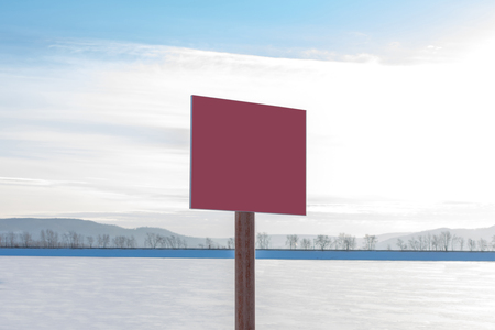 Red sign dangerously thin ice without inscription. Blank placard with space for your text. In the background you can see thin ice and snow. Central location.の写真素材