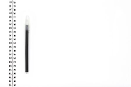 Blank paper and pen close-up. Top view, space for text or message. Blank paper mock-up.の写真素材