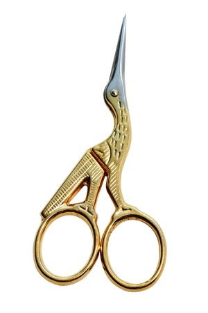 Golden Art nail sciccors isolated on the white backgroundの写真素材