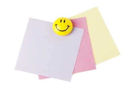 Reminder papers with smiley isolated on the white backgroundの写真素材