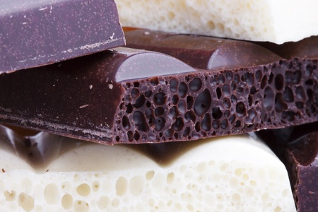 Heap of Porous white and brown chocolate の写真素材