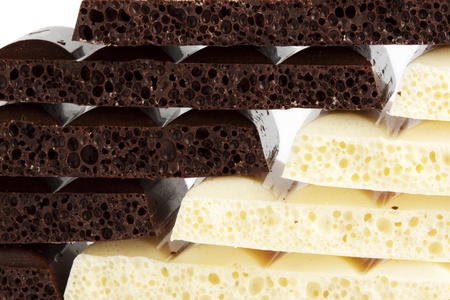 Heap of Porous white and brown chocolate の写真素材