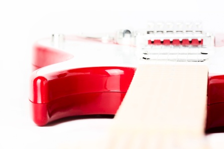 Red Electric Guitar on the white backgroundの写真素材