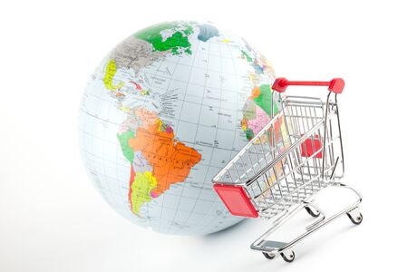 Global Market. Globe with cart on the white.の写真素材