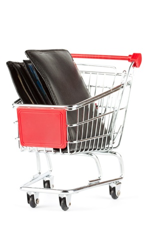 Shopping cart and black purse on the white backgroundの写真素材