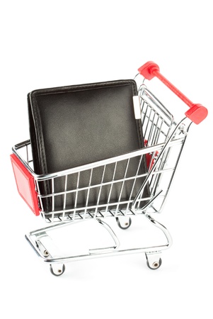 Shopping cart and black purse on the white backgroundの写真素材