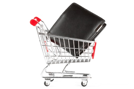 Shopping cart and black purse on the white backgroundの写真素材