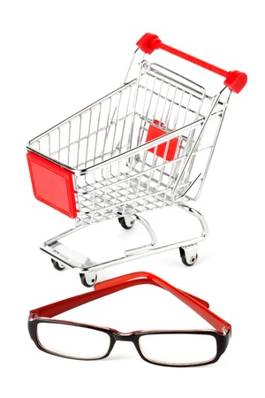 Shopping Cart with eye glasses on the white backgroundの写真素材