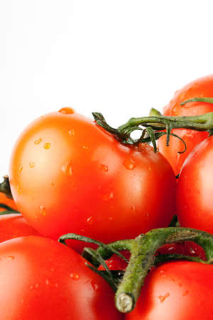Stack of perfect red tomatos extreme closeupの写真素材
