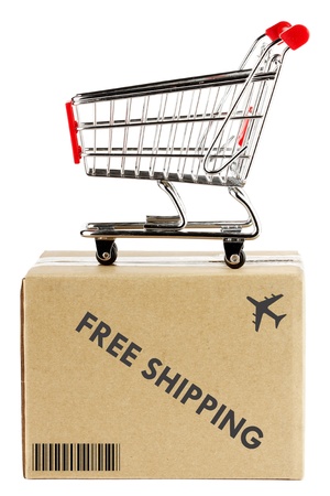 Shipment concept. Shopping cart on the box.の写真素材