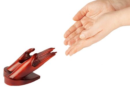 Love and help concept. Palms to palms on the white backgroundの写真素材