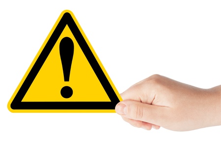 Danger And Hazard Sign in hand on the white background