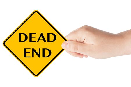 Dead end traffic sign with hand on the white backgroundの写真素材