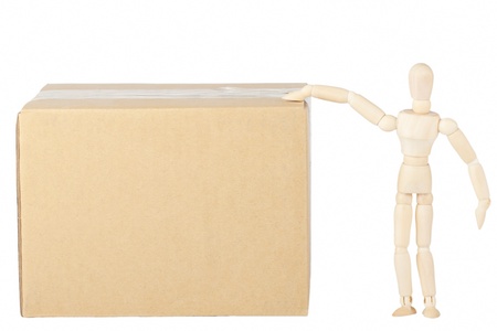 Wooden mannequin with the box on the white backgroundの写真素材