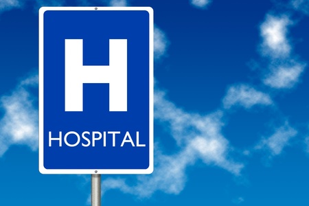 Hospital board traffic sign over blue sky backgroundの写真素材