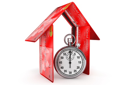 Time is Money concept. StopWatch with Credit Card on a white backgroundの写真素材