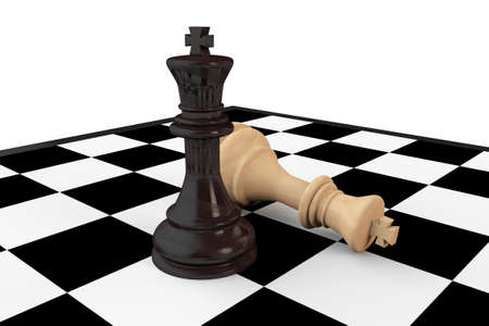 Strategy concept. Black and white chess kings on a chessboardの写真素材
