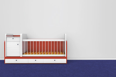 Wooden children bed against a blank gray wallの写真素材