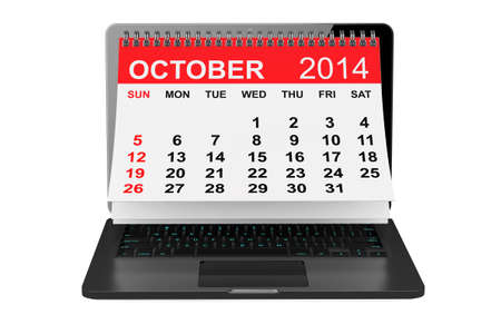 2014 year calendar. October calendar over laptop screen on a white background の写真素材
